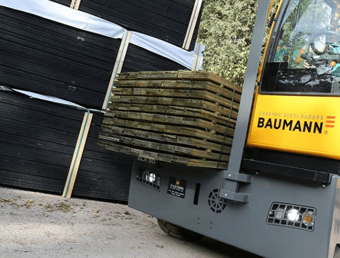 Title graphic for Baumann blog about sideloaders vs standard forklifts